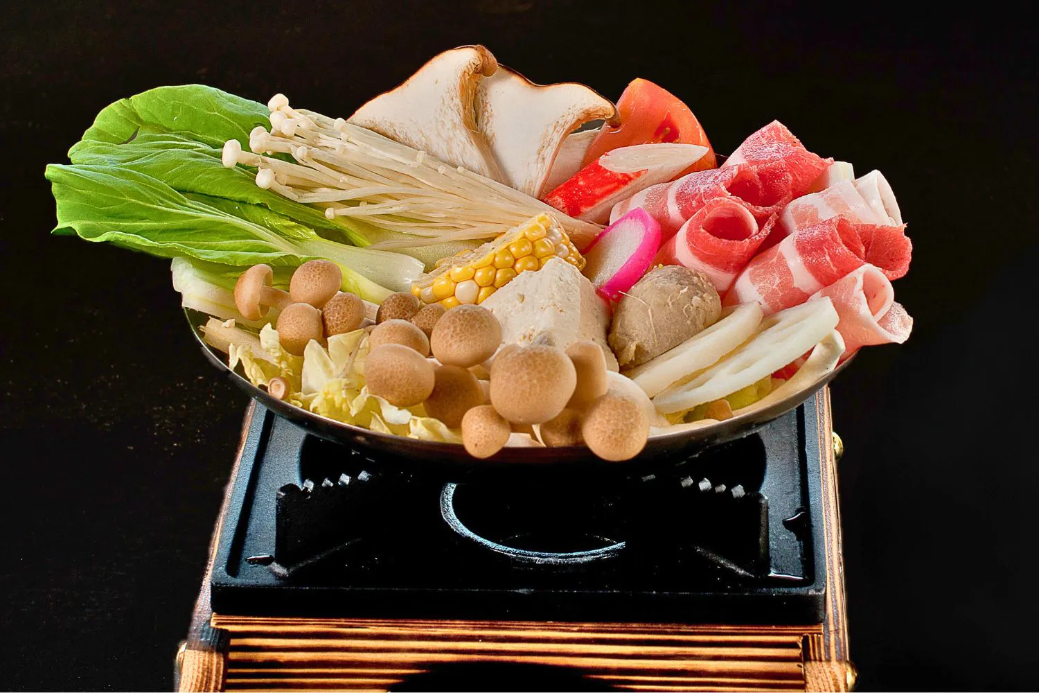 Prepped hot pot ingredients with beef, corn, shimeji mushrooms and bok choy at Feast Utopia Clackamas, an Asian Fusion Restaurant in Clackamas